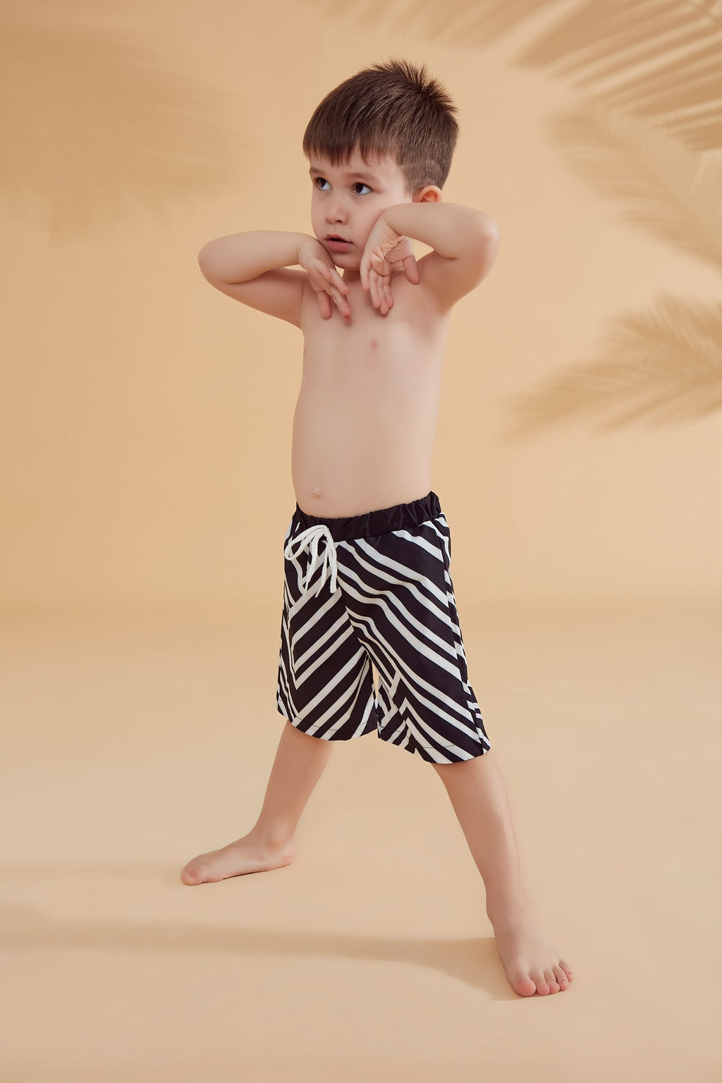 Boys black & white striped shorts